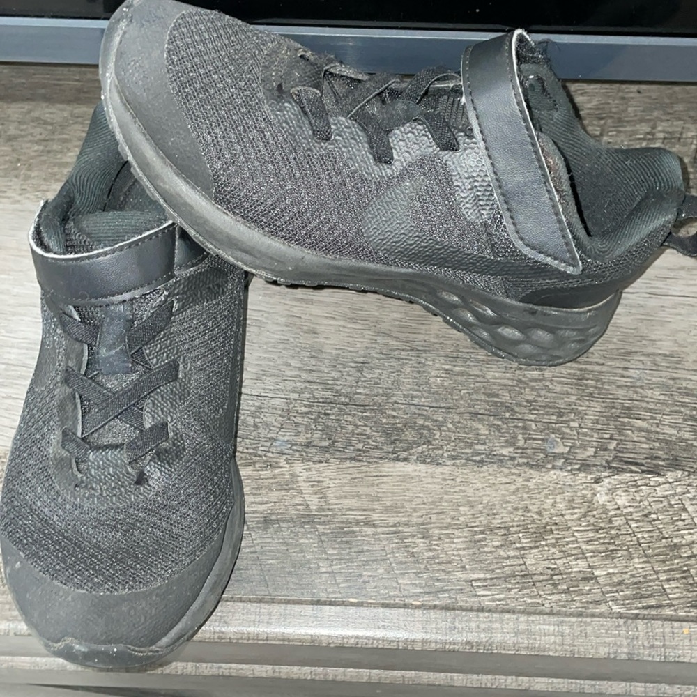 Little kids black Nike shoes